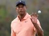 Woods and son Charlie seek title before Tiger rests sore foot