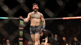 Topuria knocks out Oliveira to win UFC lightweight title at UFC 317