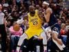 LeBron James breaks NBA record, gets hurt