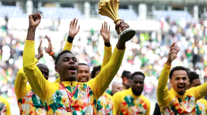 Senegal parades AFCON trophy amid controversy