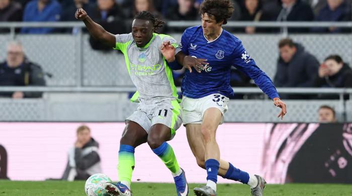 Jeremy Doku’s late heroics rescue Manchester City in six-goal thriller
