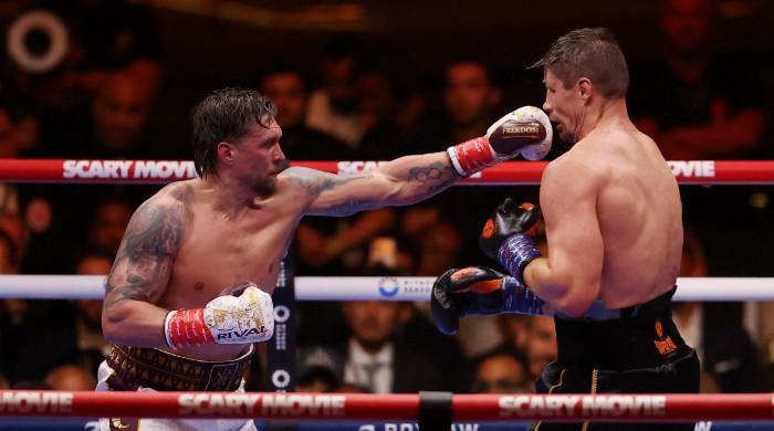 Oleksandr Usyk retains world titles after controversial win over Rico Verhoeven