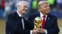 Boos greet Trump and Infantino as they enter field for World Cup trophy ceremony