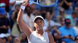 Osaka reaches US Open third round after nervy match